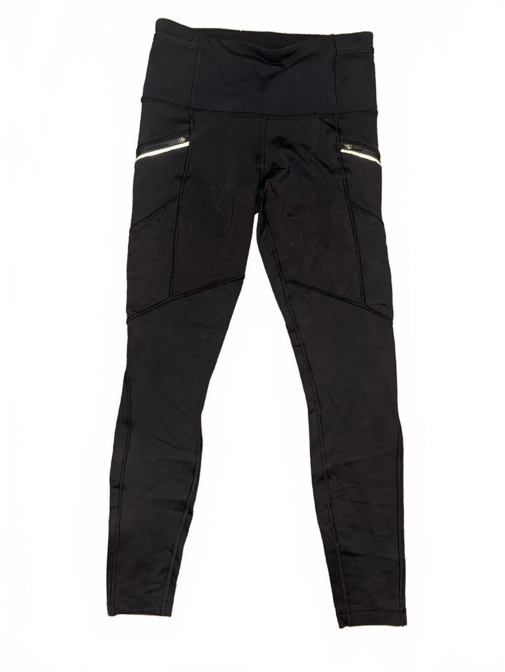 Women’s Lululemon black utility leggings with pockets size 6